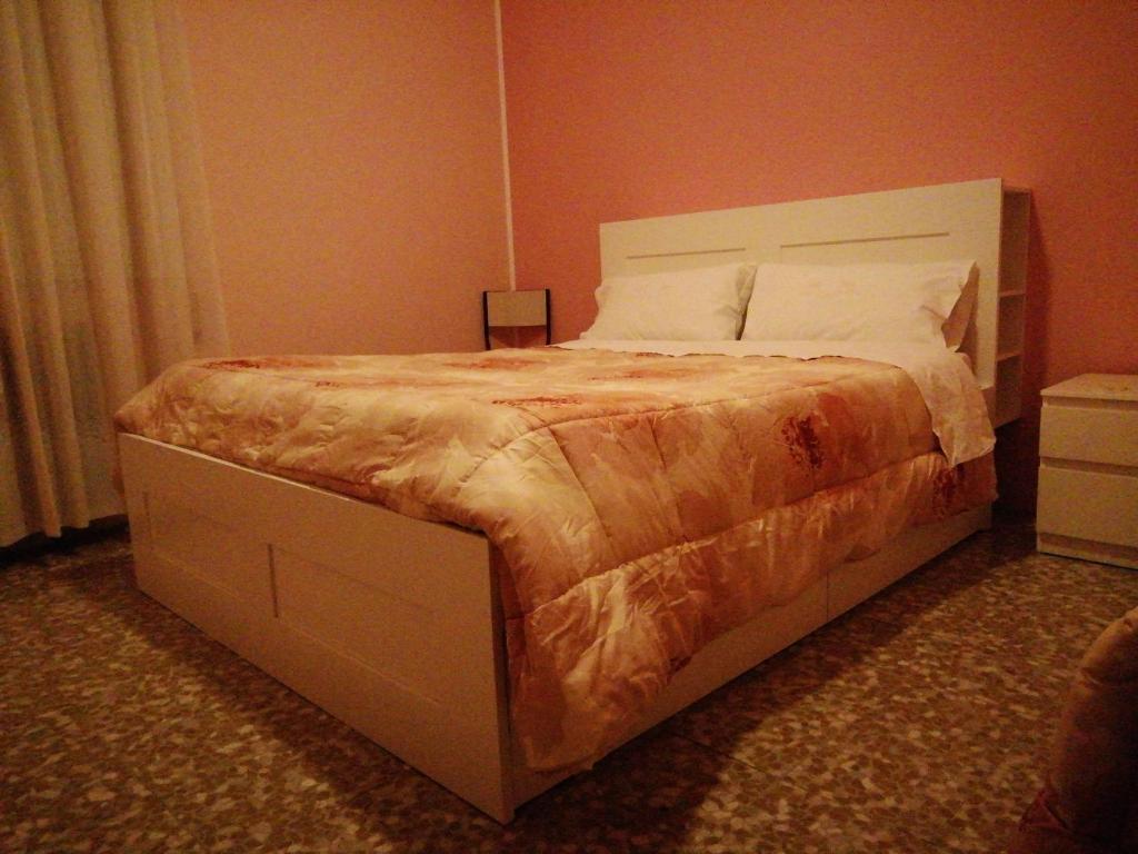 Postel nebo postele na pokoji v ubytování Aeroporto room