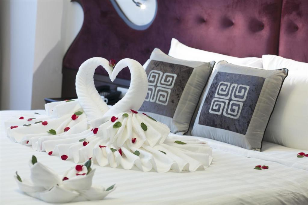 Postel nebo postele na pokoji v ubytování Labevie Hotel
