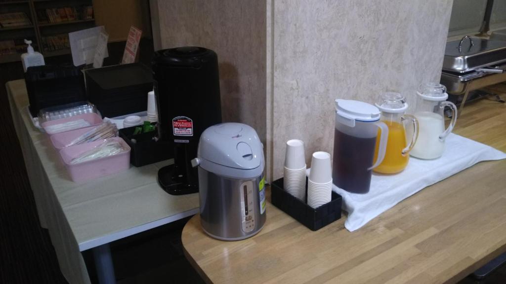 Příslušenství pro přípravu čaje a kávy v ubytování Hotel Hitachi Hills