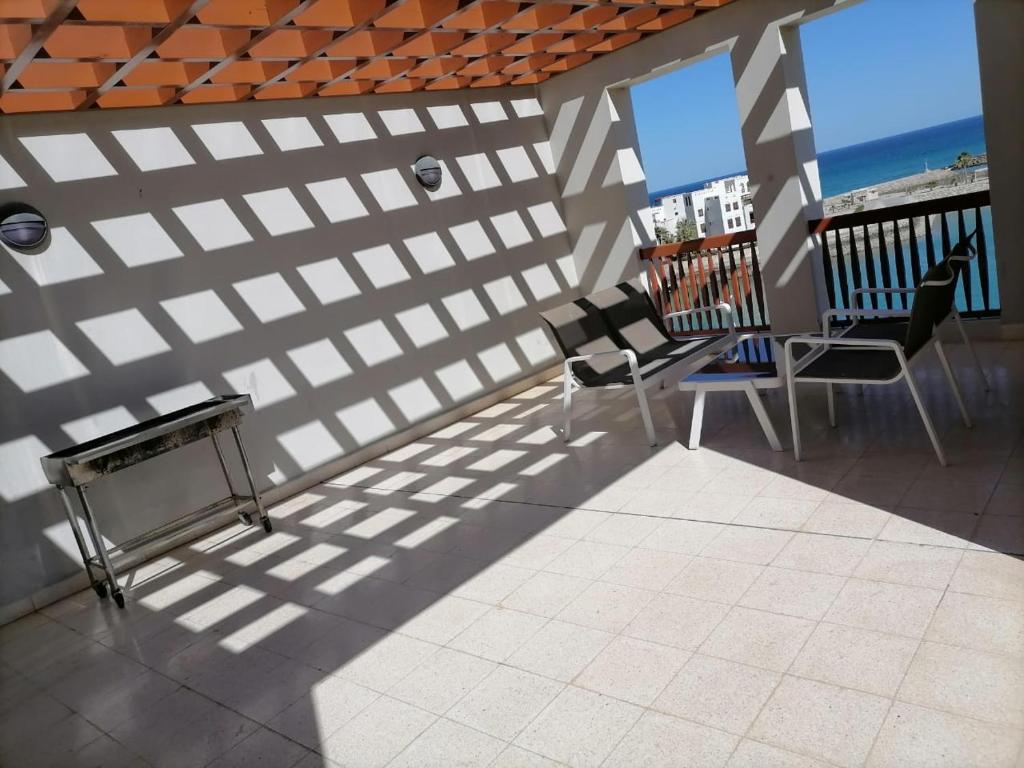 Balkón nebo terasa v ubytování Le Sifah - Marina View Apartments & Villa
