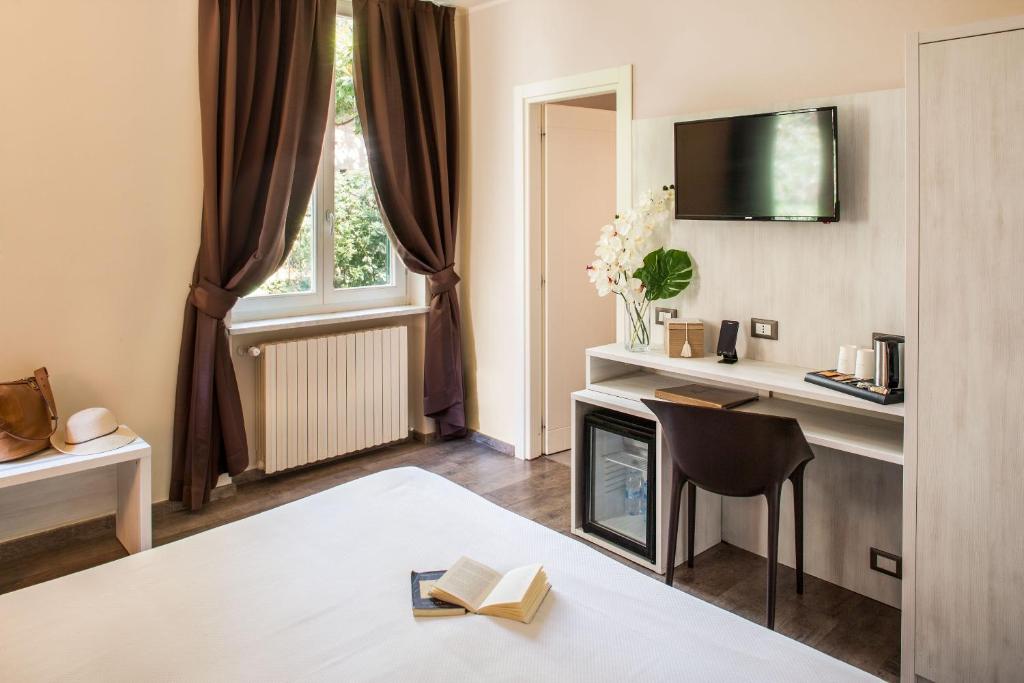 Postel nebo postele na pokoji v ubytování Villa Sylva & Spa