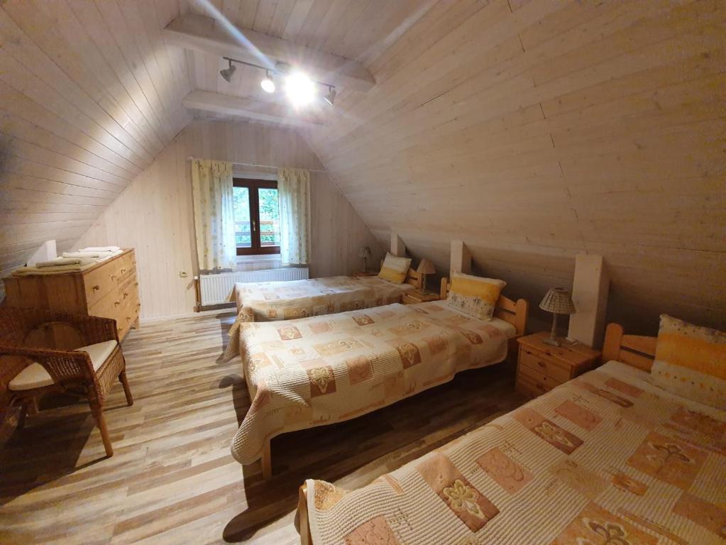 Postel nebo postele na pokoji v ubytování Zelený dom