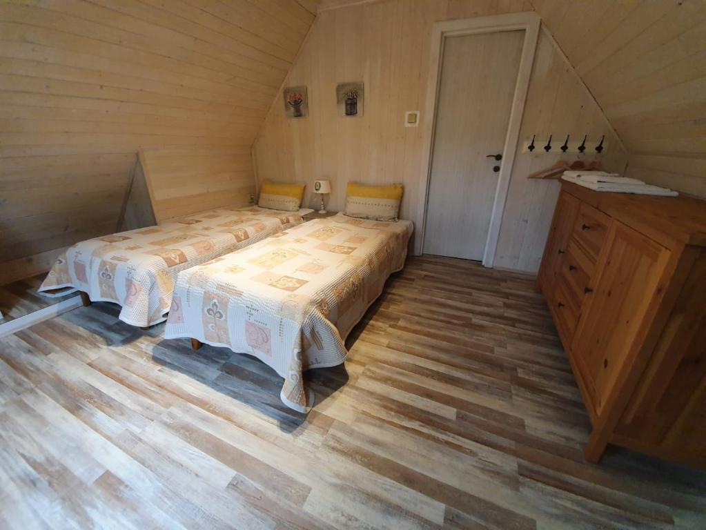 Postel nebo postele na pokoji v ubytování Zelený dom