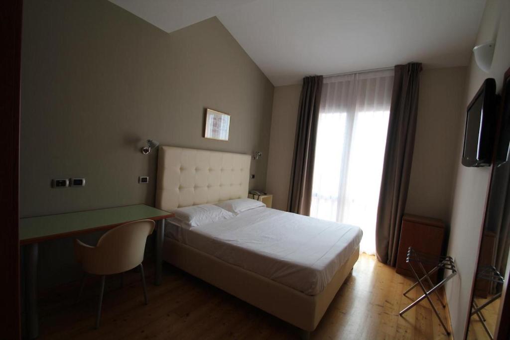 TV a/nebo společenská místnost v ubytování Hotel Rubicone