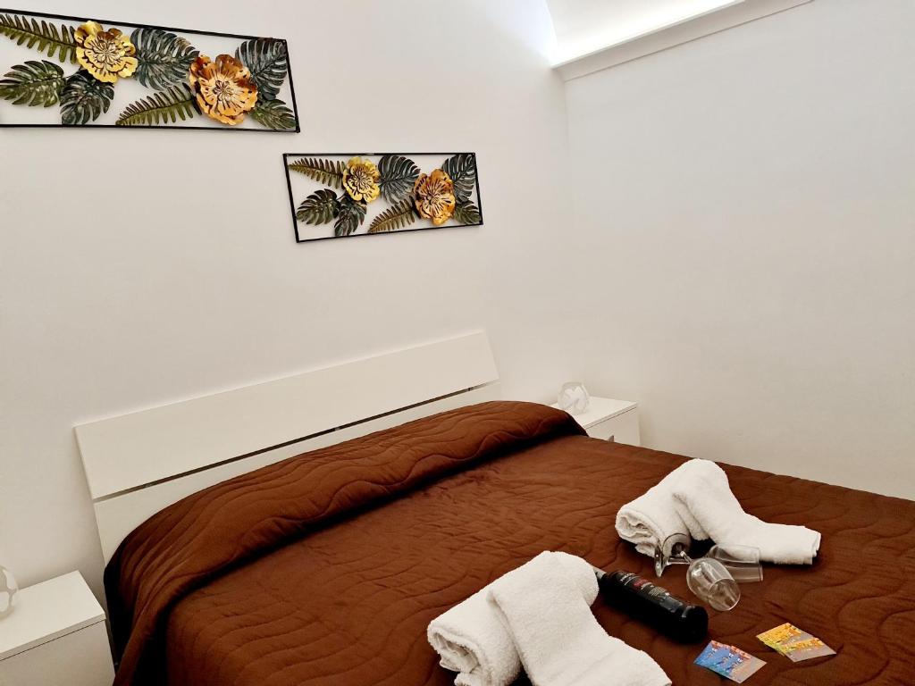 Postel nebo postele na pokoji v ubytování SCRUSCIU HOME