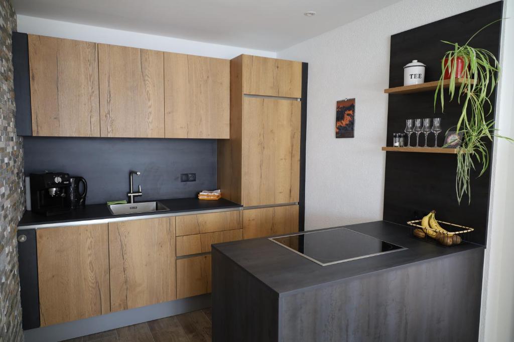 Kuchyň nebo kuchyňský kout v ubytování Gschwendtalm Tirol - Luxus-Apartment für Ihre Auszeit