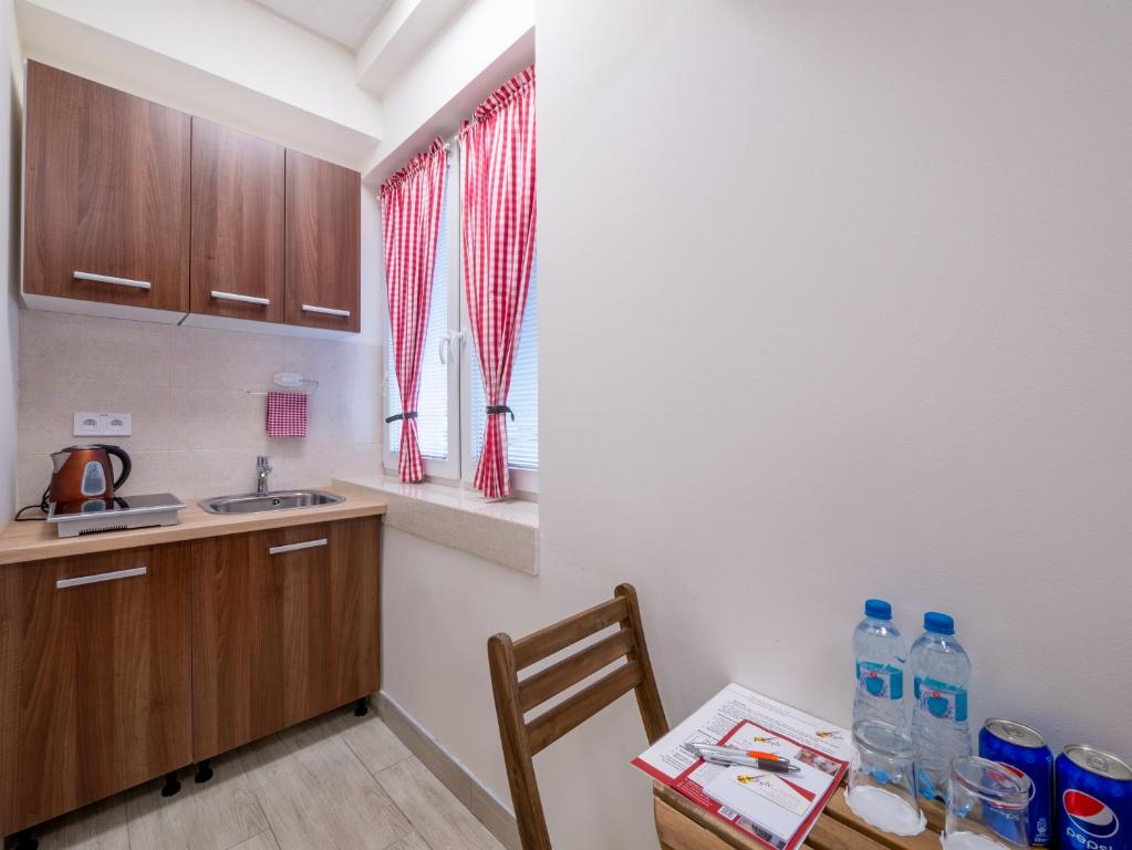 Kuchyň nebo kuchyňský kout v ubytování Apartmany Style