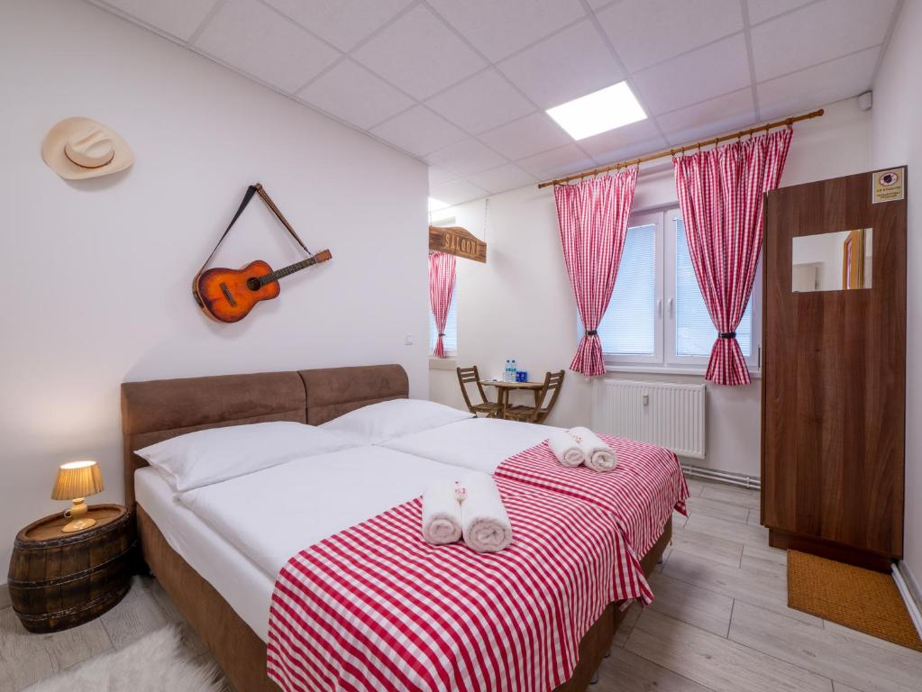 Postel nebo postele na pokoji v ubytování Apartmany Style