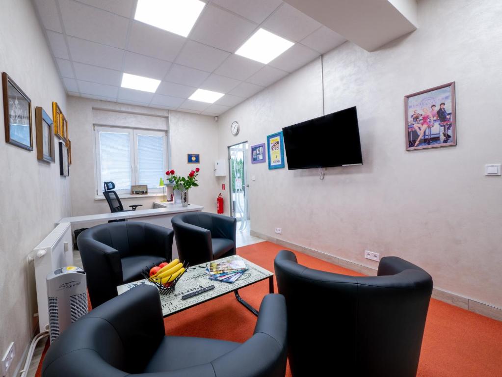 TV a/nebo společenská místnost v ubytování Apartmany Style