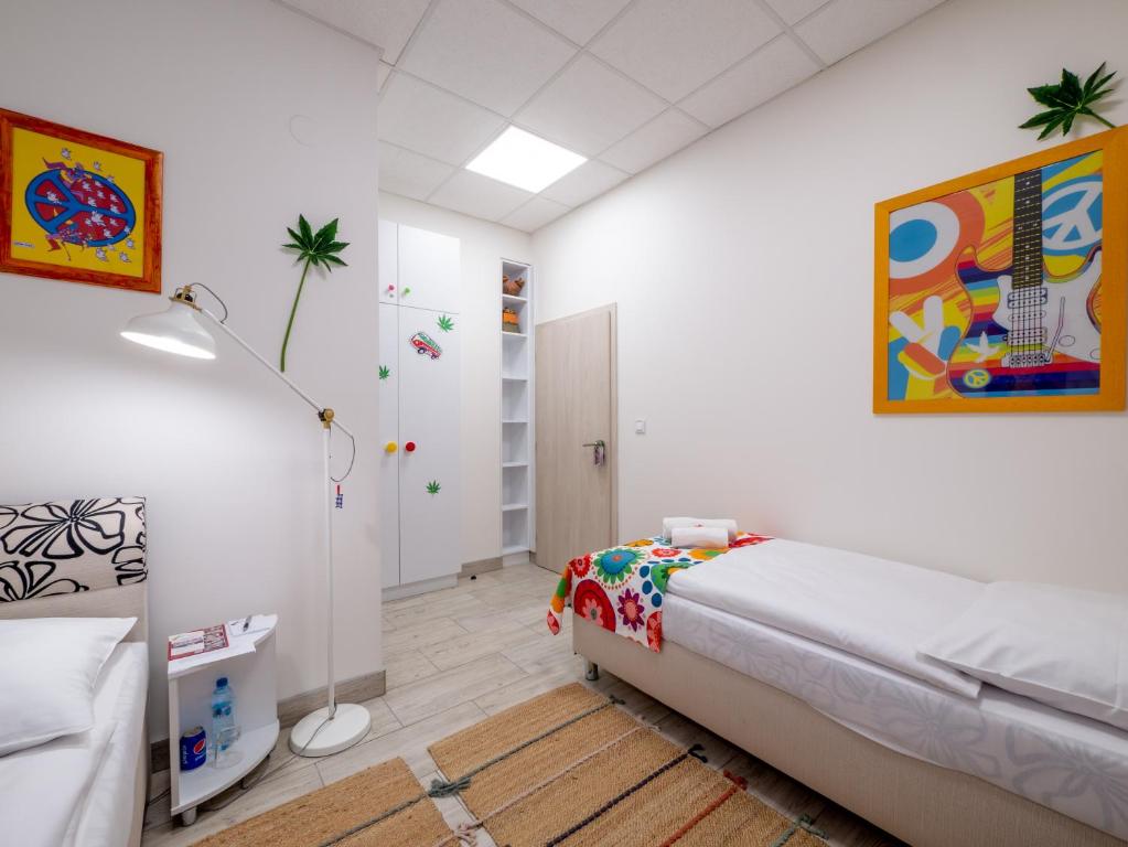 Postel nebo postele na pokoji v ubytování Apartmany Style