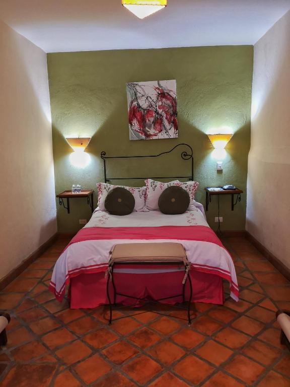 Postel nebo postele na pokoji v ubytování Hotel Casa Morena
