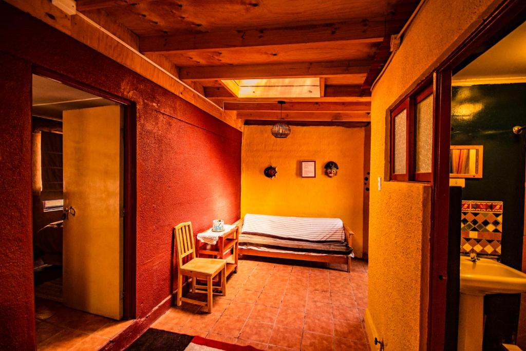 Postel nebo postele na pokoji v ubytování Incahuasi Travelodge