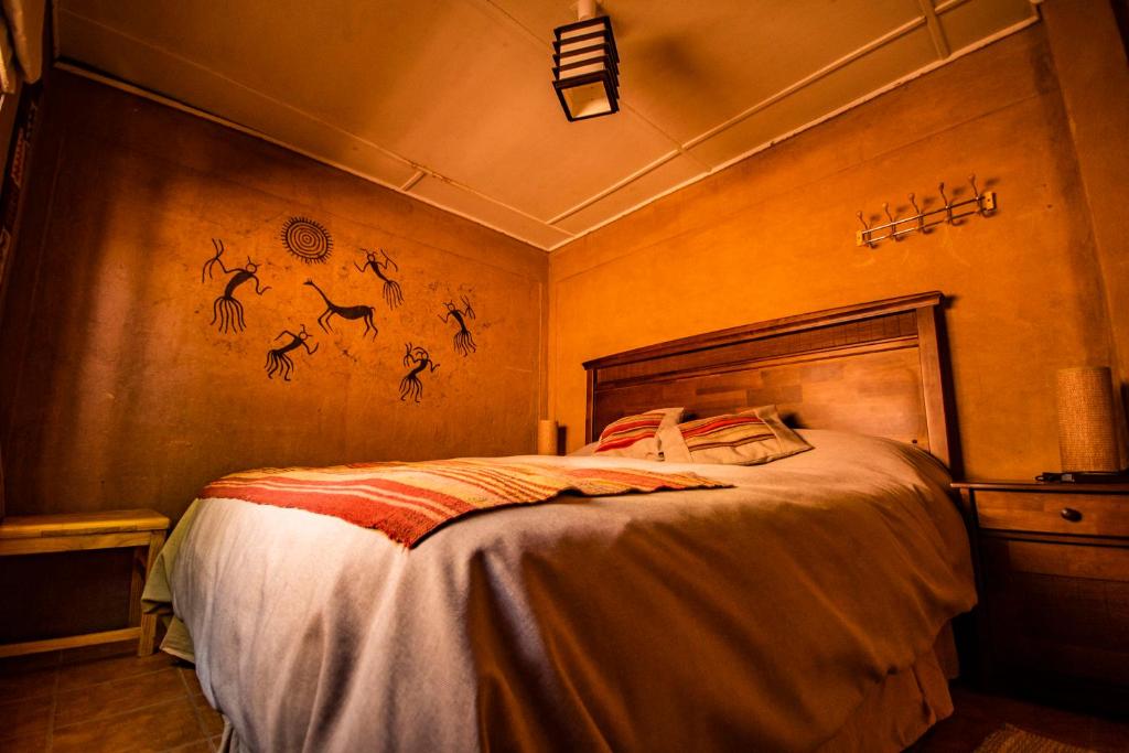 Postel nebo postele na pokoji v ubytování Incahuasi Travelodge