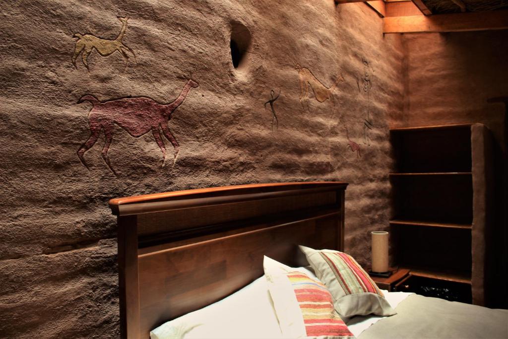 Postel nebo postele na pokoji v ubytování Incahuasi Travelodge