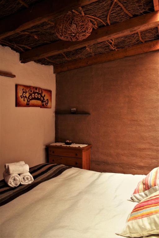 Postel nebo postele na pokoji v ubytování Incahuasi Travelodge