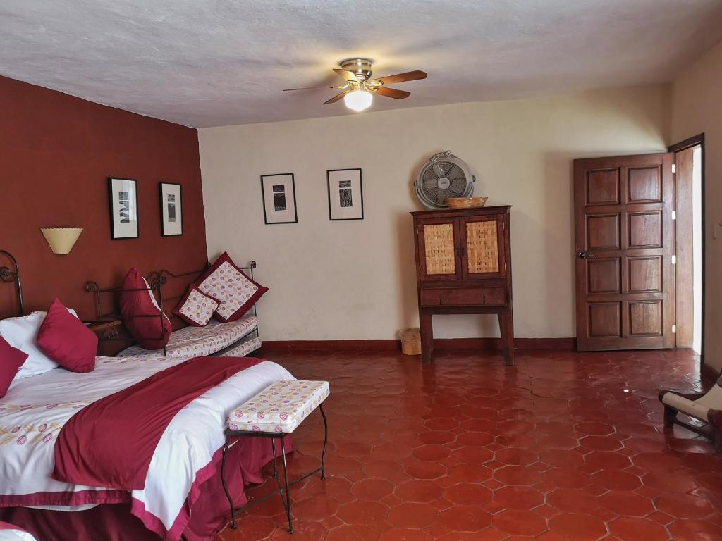 Postel nebo postele na pokoji v ubytování Hotel Casa Morena
