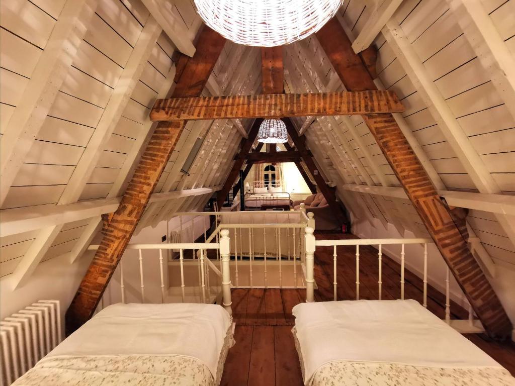 Ένα ή περισσότερα κρεβάτια σε δωμάτιο στο Old Bruges B&B