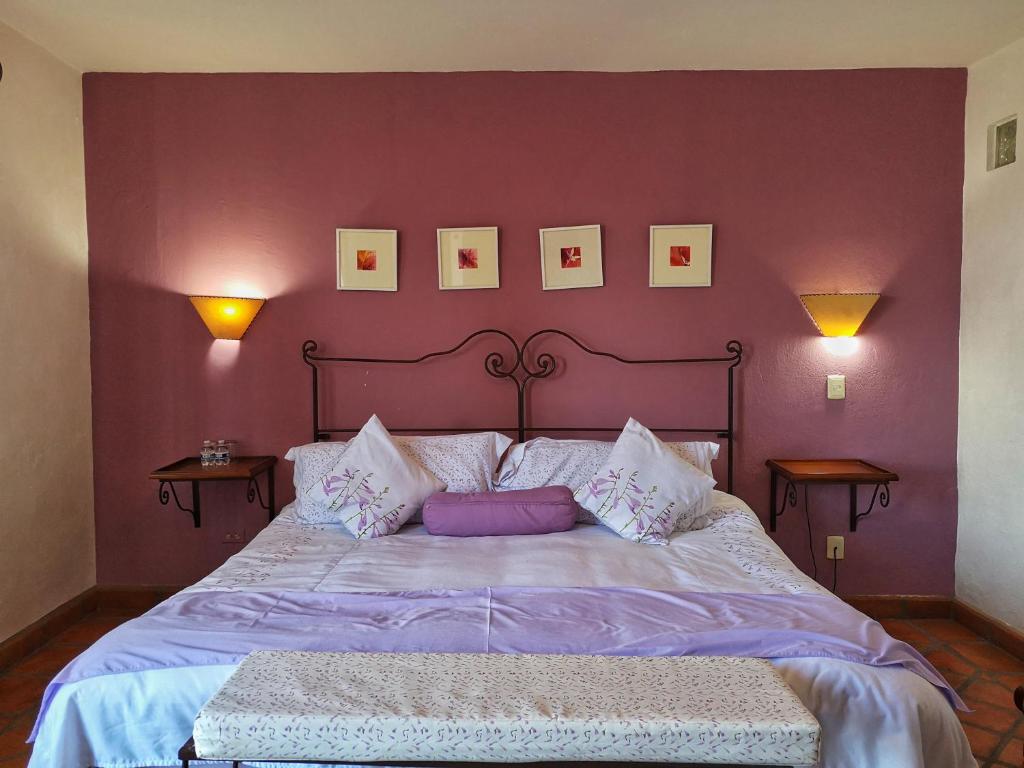 Postel nebo postele na pokoji v ubytování Hotel Casa Morena