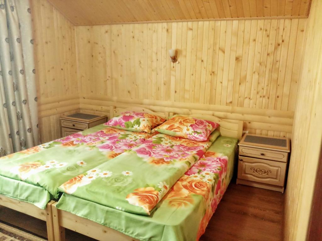 Postel nebo postele na pokoji v ubytování Садиба "У Валентини"