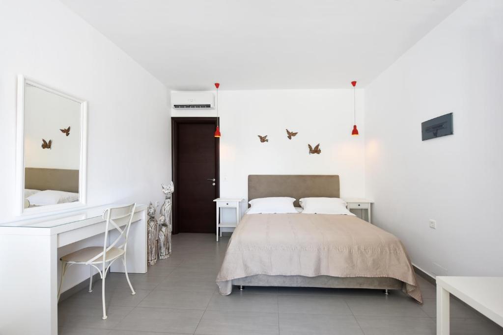 Postel nebo postele na pokoji v ubytování Tsakanos Home