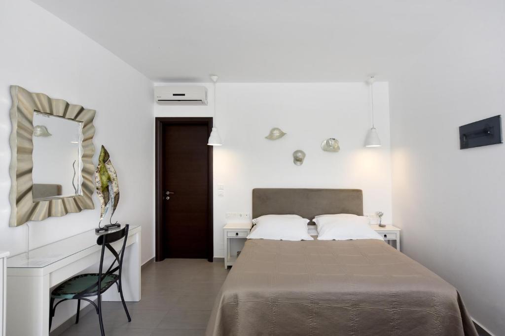 Postel nebo postele na pokoji v ubytování Tsakanos Home
