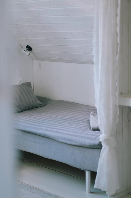Postel nebo postele na pokoji v ubytování Galleriet BnB