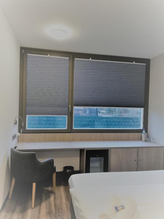 Postel nebo postele na pokoji v ubytování Hotel & Restaurant Alte Molkerei Kölleda