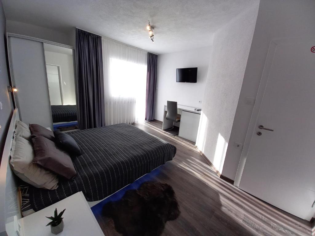 Posteľ alebo postele v izbe v ubytovaní Premier House by RD Group