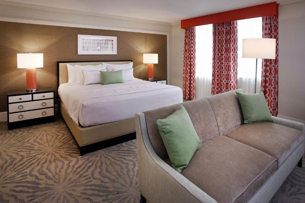 
a hotel room with two beds and two lamps at Resorts Casino Hotel Atlantic City in Atlantic City
