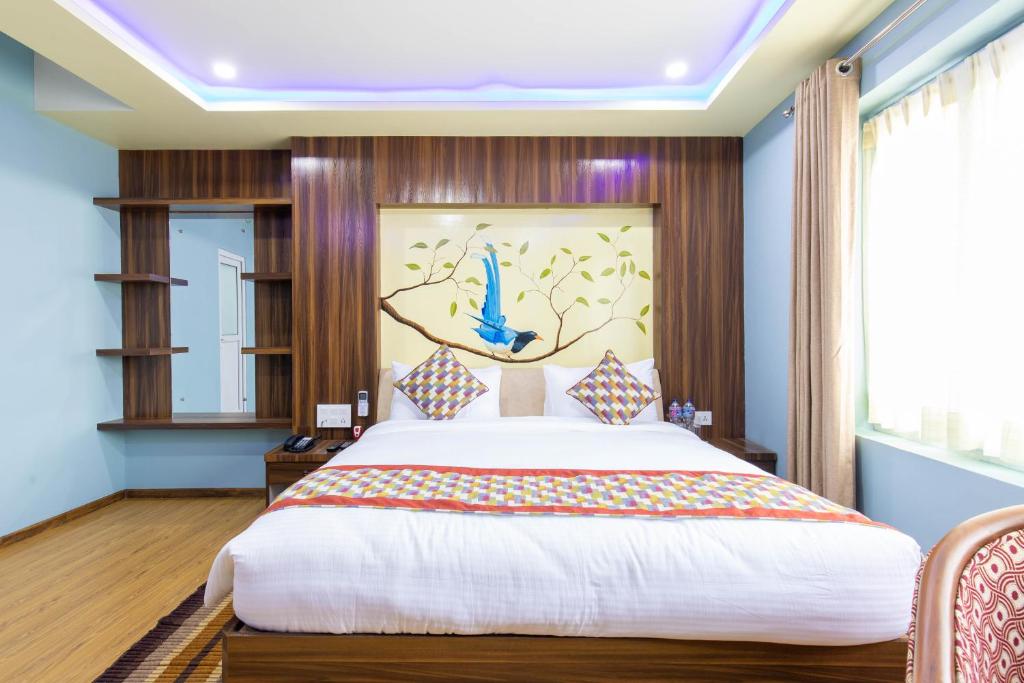 Letto o letti in una camera di Siddhartha Hotel Grand City