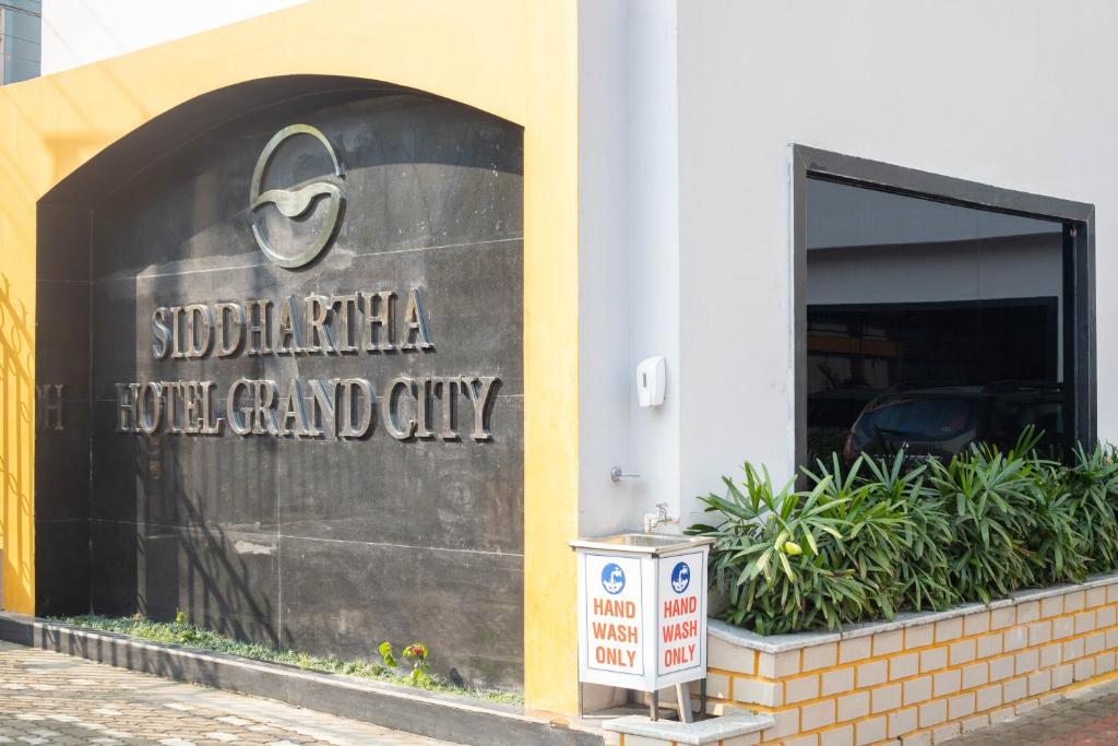Certificato, attestato, insegna o altro documento esposto da Siddhartha Hotel Grand City