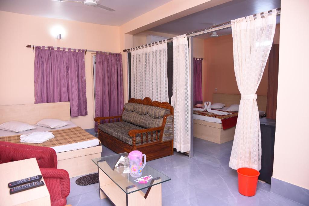 Postel nebo postele na pokoji v ubytování Hotel SagarPriya