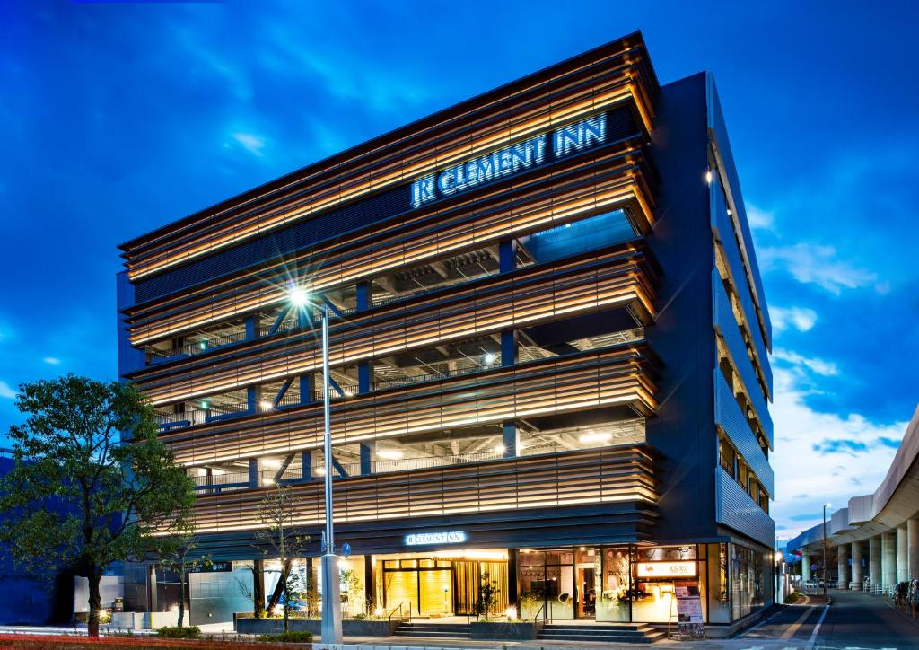 an office building with a sign that reads n element inn at JR Clement Inn Kochi in Kochi