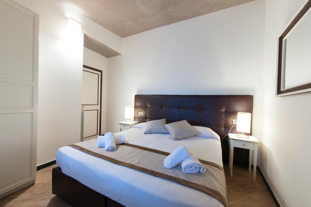 Łóżko lub łóżka w pokoju w obiekcie Villa Giada Resort