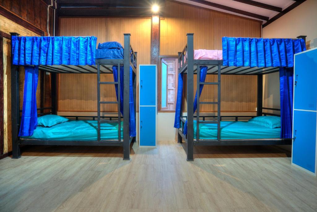 Bata Merah Homestay - 女宿舍的单人床