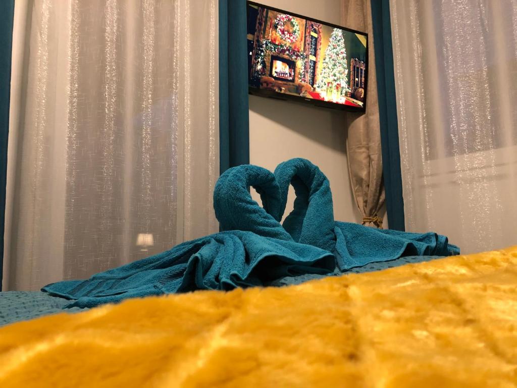 Katil atau katil-katil dalam bilik di Türkiz Wellness Siófok