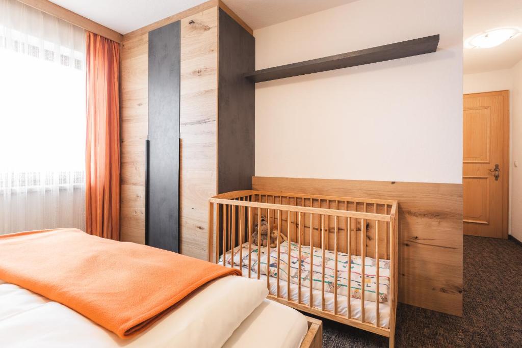 Postel nebo postele na pokoji v ubytování An der Via Claudia Augusta
