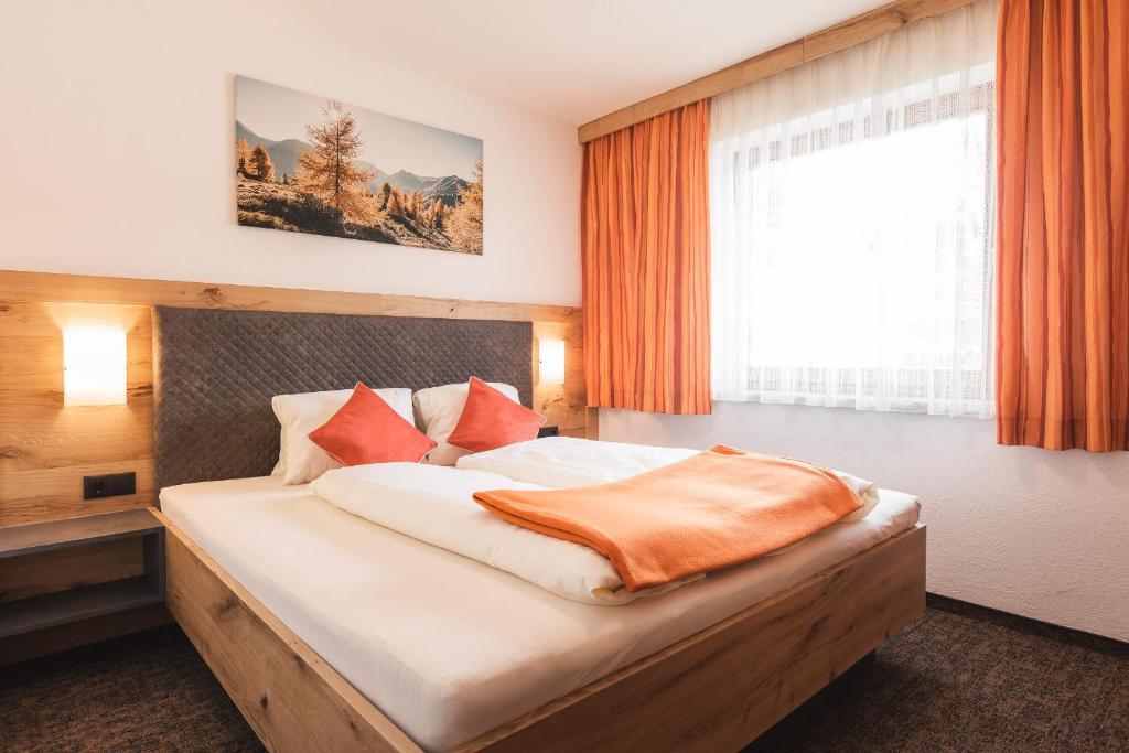 Postel nebo postele na pokoji v ubytování An der Via Claudia Augusta
