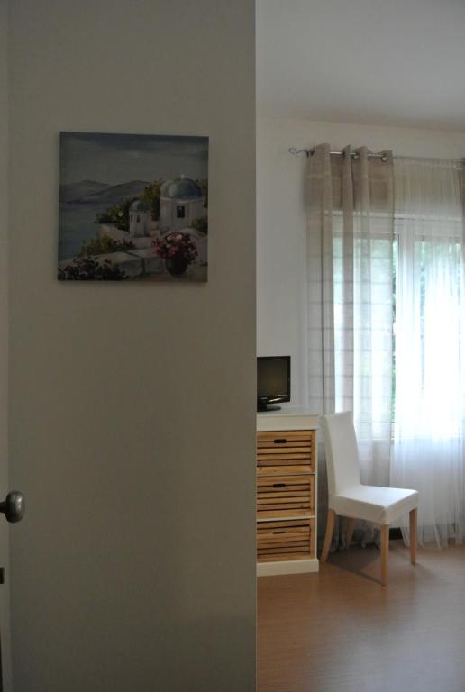 Televízia a/alebo spoločenská miestnosť v ubytovaní B&B Via Dei Templi