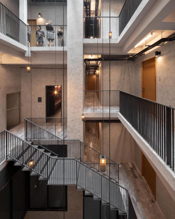 a view of a staircase in a building at Luk Hostel in Bangkok
