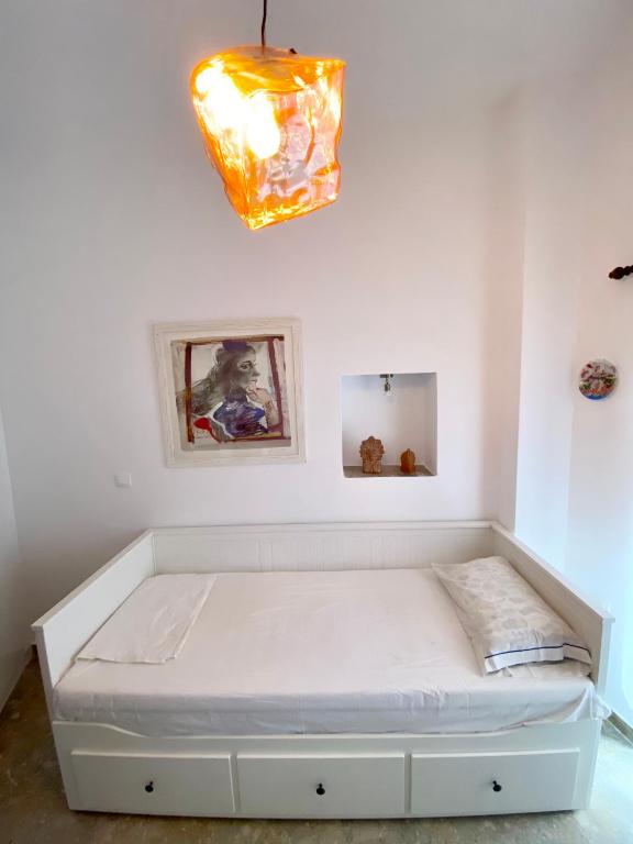 Postel nebo postele na pokoji v ubytování Lion House I