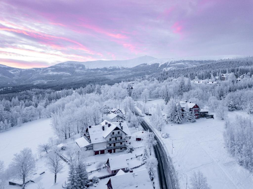 an aerial view of a house in the snow at L&B Spa in Karpacz