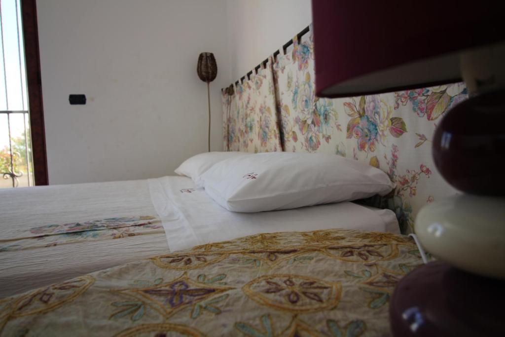 Postel nebo postele na pokoji v ubytování Casa Sbrizza
