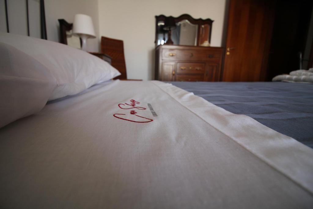 Postel nebo postele na pokoji v ubytování Casa Sbrizza