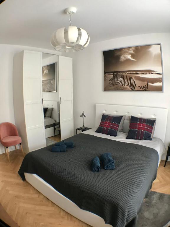 Posteľ alebo postele v izbe v ubytovaní Apetyt na Gdańsk Apartament z prywatną sauną