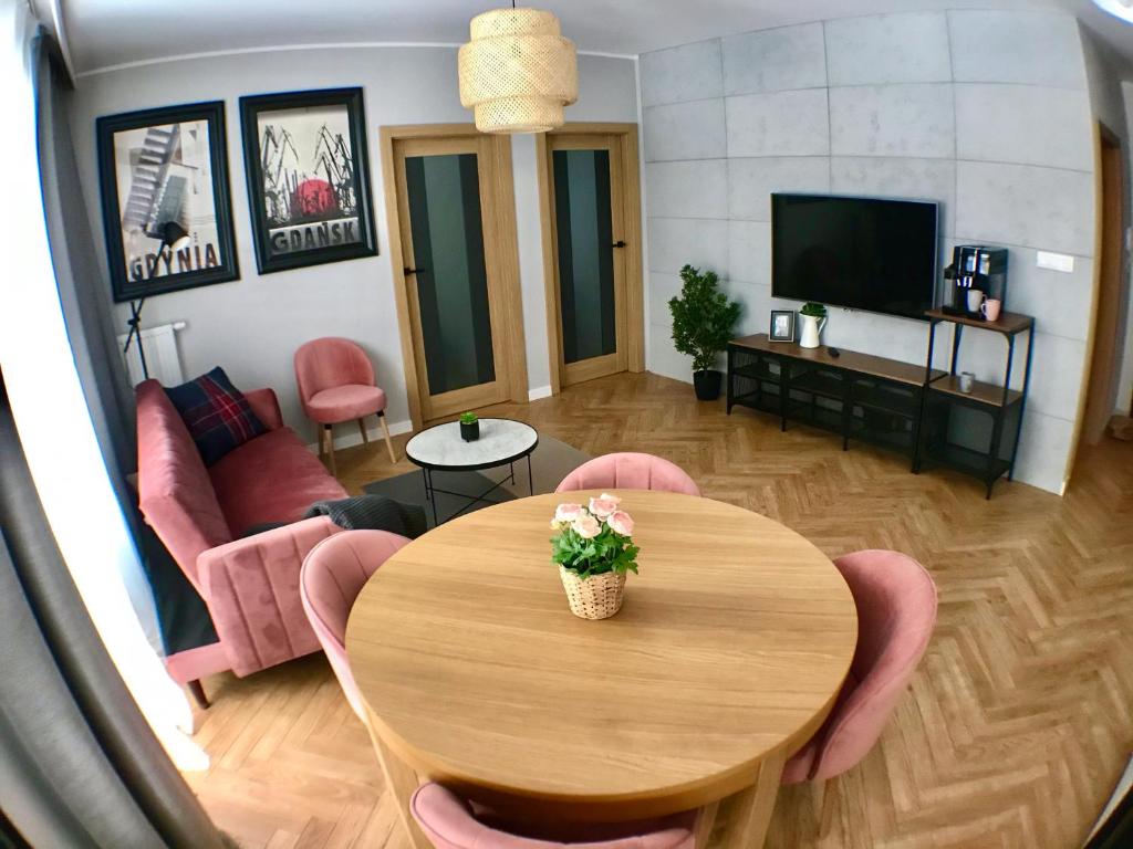 Televízia a/alebo spoločenská miestnosť v ubytovaní Apetyt na Gdańsk Apartament z prywatną sauną