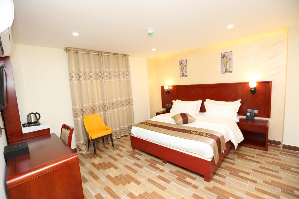Postel nebo postele na pokoji v ubytování Venus Hotel