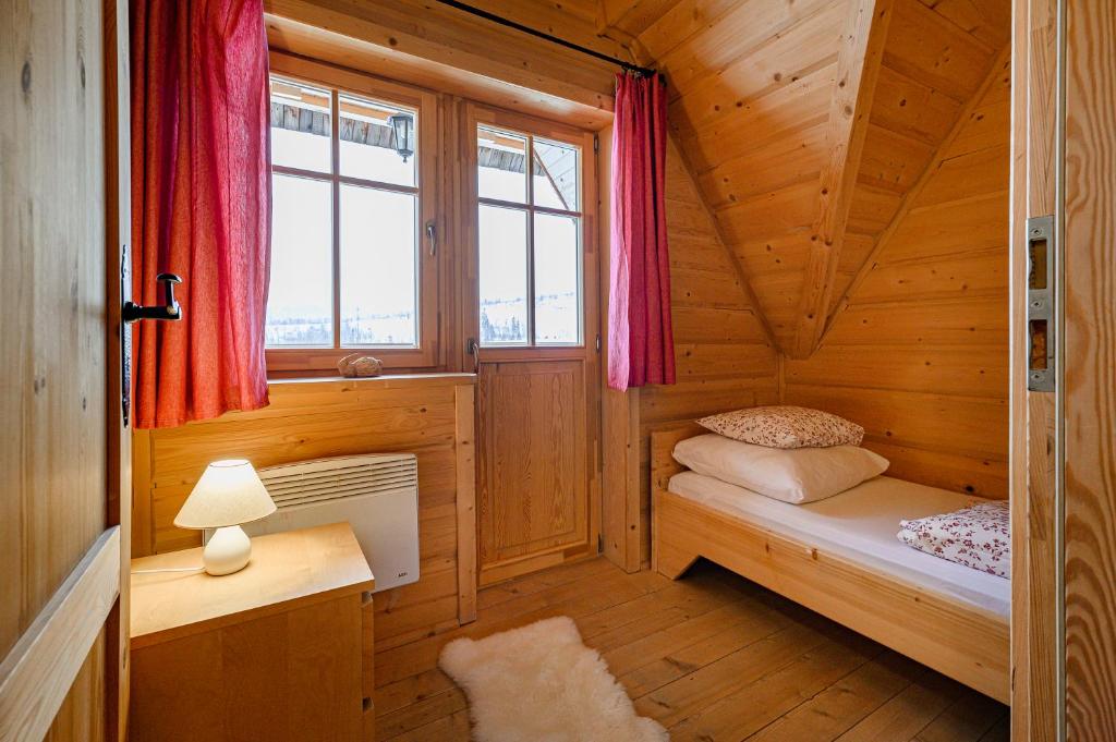 Posteľ alebo postele v izbe v ubytovaní Sun&Ski Maciejówka