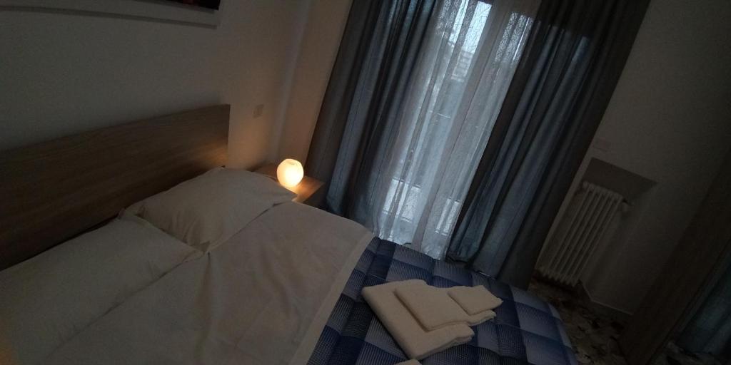 Posteľ alebo postele v izbe v ubytovaní Station suite