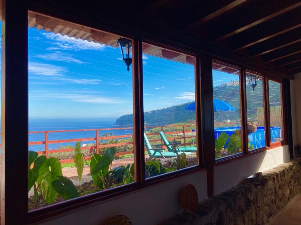a view of the ocean from a room with windows at Casa Vistazul in La Orotava